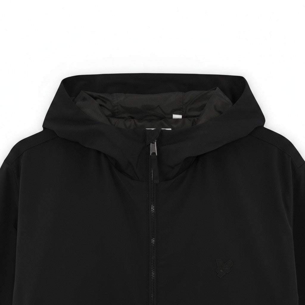 WILDVINE Clothing Co. black nylon zip-through hooded jacket with a minimalist design and tonal logo detail.