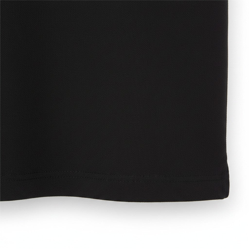 WILDVINE Clothing Co. jet black textured polo shirt hem detail showing high quality fabric construction