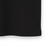 WILDVINE Clothing Co. jet black textured polo shirt hem detail showing high quality fabric construction