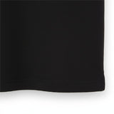 WILDVINE Clothing Co. jet black textured polo shirt hem detail showing high quality fabric construction