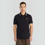 WILDVINE Clothing Co. Lyle & Scott jet black polo shirt with tipped collar and yellow logo on chest worn by a model