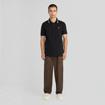 WILDVINE Clothing Co. Lyle & Scott jet black tipped track polo shirt with yellow eagle logo worn by a male model