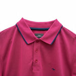 WILDVINE Clothing Co. grape purple 2-ply pique cotton polo shirt with navy blue collar trim and embroidered logo.