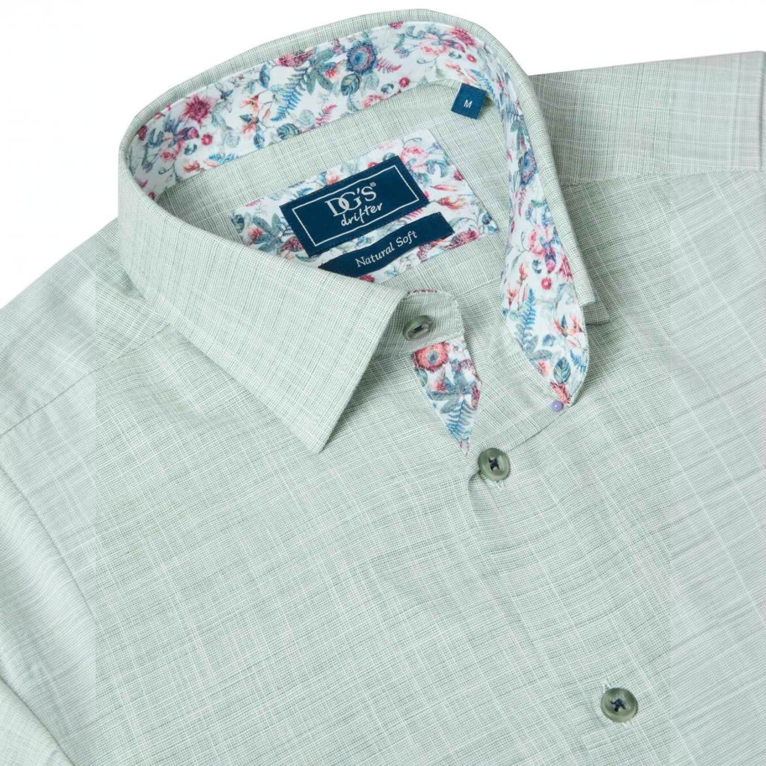 WILDVINE Clothing Co. light green textured short sleeve shirt with floral print collar lining and button-down front