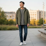 WILDVINE Clothing Co. man wearing a khaki ash zip-through hooded jacket with jet black details over a grey t-shirt.
