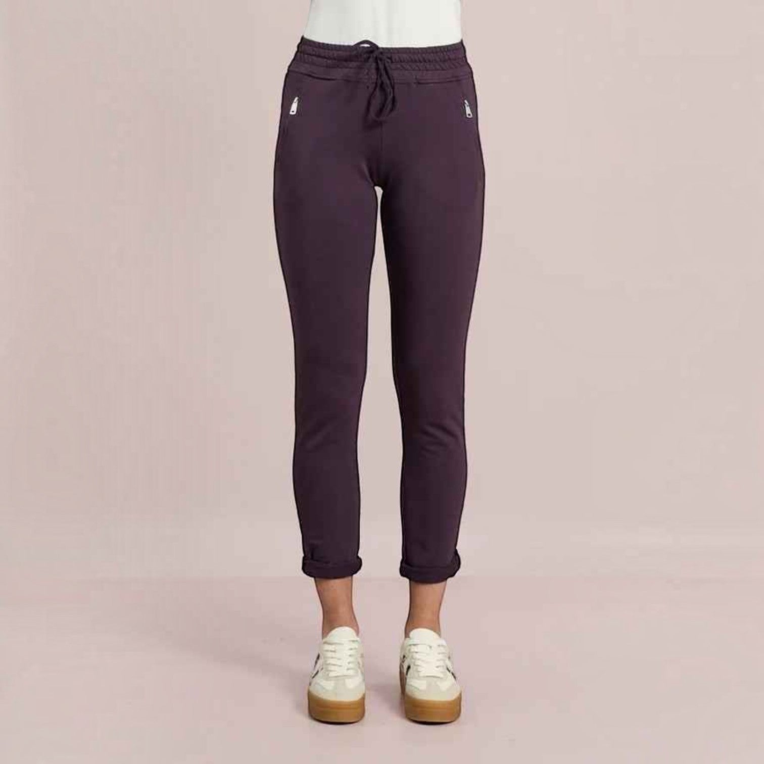 WILDVINE Clothing Co. D.E.C.K By Decollage mulberry joggers with zip pockets, drawstring waist, and turn-up hems.