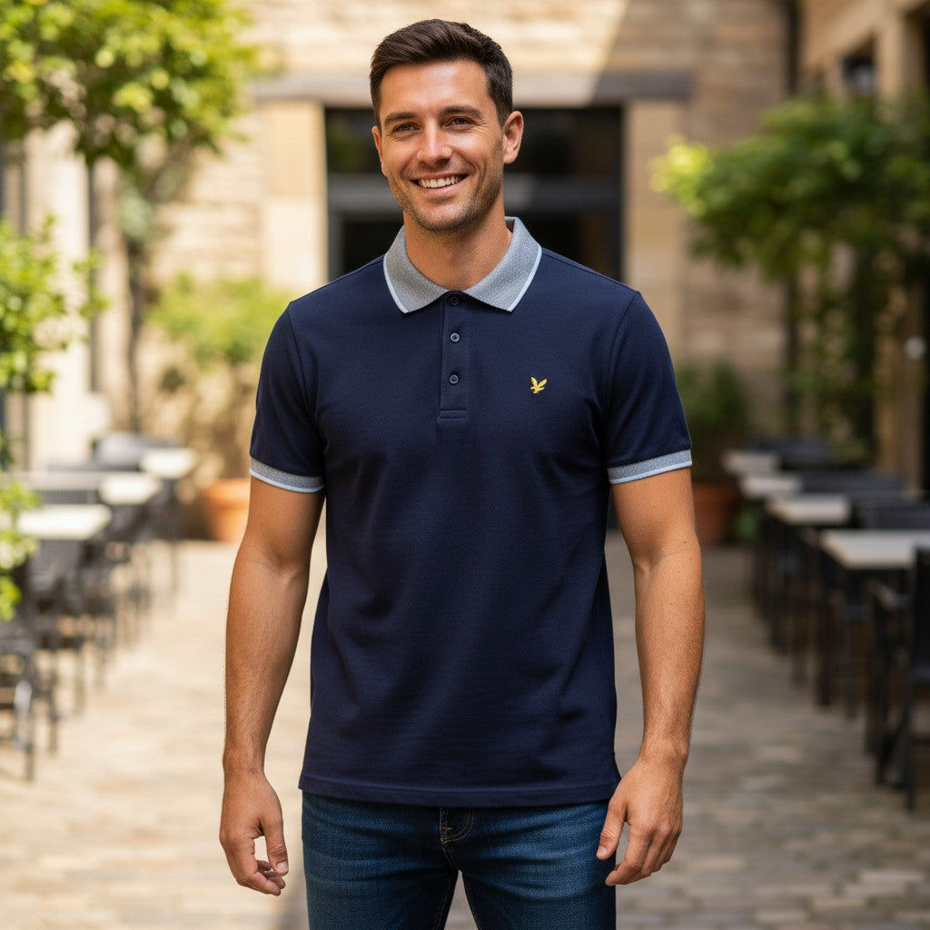 WILDVINE Clothing Co. Lyle & Scott dark navy polo shirt with light blue birdseye collar and sleeve trim on a man