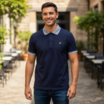 WILDVINE Clothing Co. Lyle & Scott dark navy polo shirt with light blue birdseye collar and sleeve trim on a man
