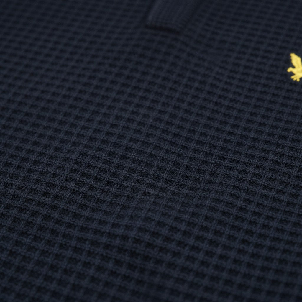 WILDVINE Clothing Co. dark navy waffle-knit polo shirt with signature golden eagle logo embroidery