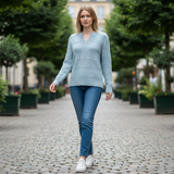 WILDVINE Clothing Co. Marieke pullover in powder blue with cable and pointelle knit detail worn by a blonde model.